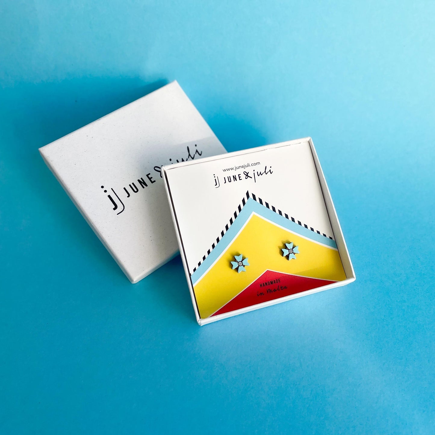 Maltese Cross Stud Earrings in Sky Blue on Luzzu Card