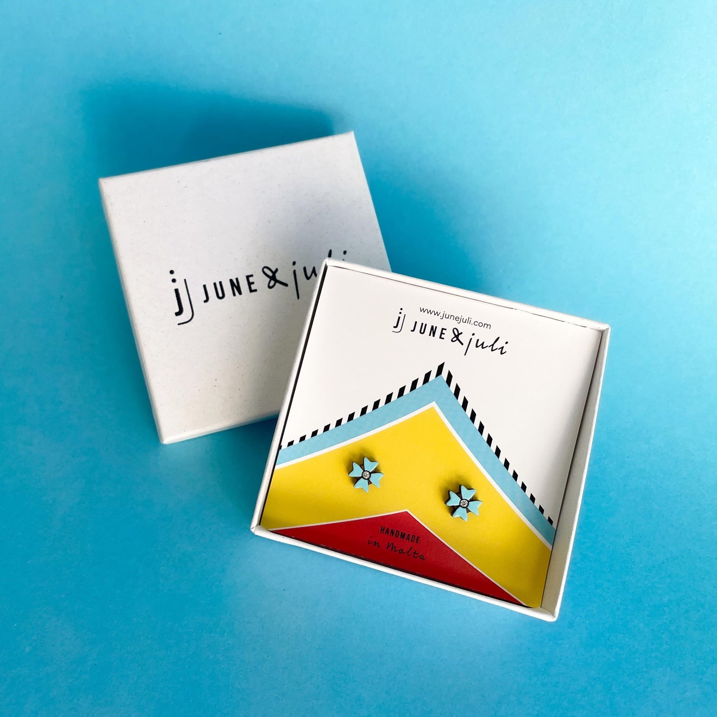 Maltese Cross Stud Earrings in Sky Blue on Luzzu Card